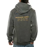 Canguro gris con capucha, cordones ajustables, bolsillo tipo canguro y logo estampado en el pecho.