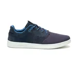 Zapatillas Caterpillar Pause Canvas color azul marino con cordones azules y suela blanca.