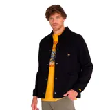 Chaqueta negra de twill de algodón con cierre frontal a presión, bolsillos superiores en el pecho y en la parte inferior, puños elásticos, forro con logo de Caterpillar y bolsillo interior en el pecho.