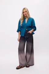 Pantalón de jean wide leg con lavado degradé.
