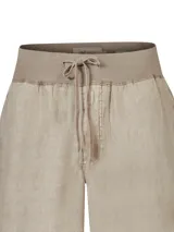 Pantalón de lino color beige, con pretina de jersey ajustable, calce regular, bolsillos en el frente y trasero.