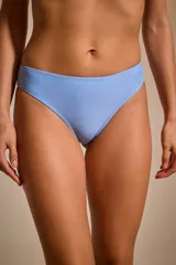 Colaless de lycra celeste liso, corte clásico.