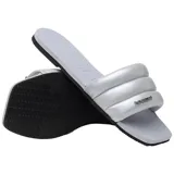 Sandalias Havaianas modelo You Milan Metallic, color gris con tiras puffy y logo metálico.