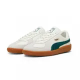Championes Puma Army Trainer blancos con detalles en negro y gamuza gris. Suela de goma color caramelo.