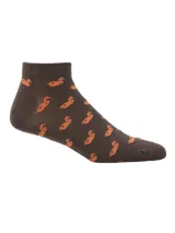 Calcetines tobilleros color marrón con estampado de patos color naranja.