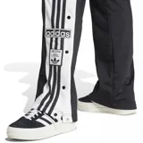 Pantalón deportivo Adidas Adibreak negro con rayas blancas a los costados, cintura elástica y botones a presión en los laterales.