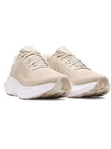 Championes Under Armour Charged Rogue 5 color beige con suela blanca, ideales para running.