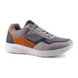 Championes deportivos American Sport Maurice, con suela blanca y diseño en bloques de color azul, verde oliva, gris y negro.