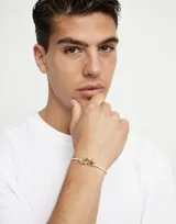 Pulsera de cuero trenzado color rosa con cierre de mosquetón entrelazado bañado en oro de 18k.