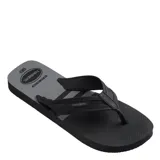 Sandalias Havaianas City Basic para hombre, color negro con plantilla gris y tiras verdes con el logo de la marca.