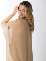 Vestido túnica blanco de seda italiana con frunce, calce oversized y talle único. Lleva forro elastizado al tono.