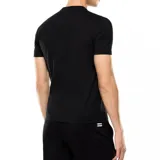 Remera de manga corta, cuello redondo, color negro, con el logo EA7 Emporio Armani estampado en tono gris oscuro en el centro del pecho.