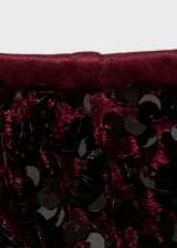 Short negro de tiro alto, con lentejuelas en toda la prenda.