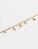 Collar corto dorado con cadena de eslabones y multidijes de frutas con strass y de metal.