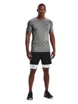 Calza corta de compresión Under Armour HeatGear color blanco, con cintura elástica ancha con logo de la marca en gris.