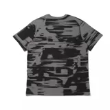 Remera gris con estampado abstracto en negro y logo de Jordan en el pecho.