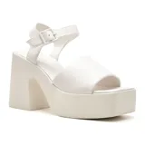 Sandalias negras de vestir con plataforma y taco ancho.