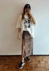 Remerón blanco de algodón y poliéster con estampado de fotos en blanco y negro.