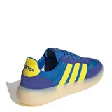 Championes urbanos Adidas Barreda Decode, color azul con detalles en amarillo y suela color crema.