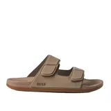 Sandalias Reef color beige con dos tiras ajustables con velcro y logo de la marca en el lateral.