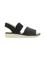 Sandalias negras de cuero con tiras anchas y elástico en el empeine y el talón. Suela acolchada color hueso.