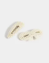 Set de dos hebillas tic tac para el pelo, una con forma triangular y otra con forma de moño, ambas decoradas con perlas.