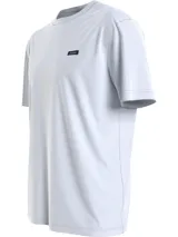 Remera blanca de algodón con cuello redondo y logo de Calvin Klein en el pecho.