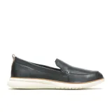 Mocasín de cuero negro con suela blanca y detalle de costuras en la parte superior.