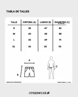 Bermuda color verde oliva de lino, corte holgado y largo hasta la rodilla.