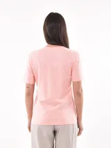 Remera blanca de algodón con estampado de limones y texto en azul.