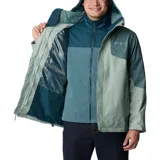 Campera Columbia 3 en 1 color marrón, con capa exterior impermeable y transpirable, y forro polar térmico reflectante.