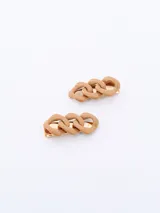 Set de dos broches para el pelo color beige con forma de eslabones de cadena.