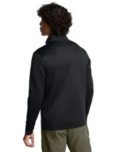 Buzo deportivo Under Armour Drive Pro, color verde agua, con cierre parcial frontal, cuello alto y logo en el pecho.