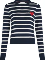 Sweater de punto a rayas horizontales azul marino y blanco, con cuello redondo y gráfico de corazón rojo con la firma Tommy Hilfiger bordada en el pecho.
