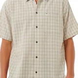 Camisa de manga corta con estampado a cuadros en tonos beige y blanco, con cuello clásico y bolsillo en el pecho.