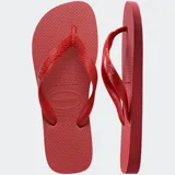 Ojotas Havaianas Top color blanco, con suela de goma y tiras con diseño de espiga.