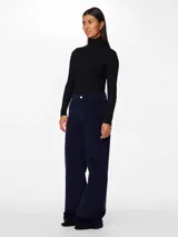 Pantalón de pana azul marino de corte ancho.