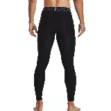 Calza deportiva Under Armour HeatGear para hombre, color negro con logo en blanco en la pierna izquierda y cintura elástica con la inscripción "Under Armour".