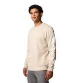 Buzo Columbia de hombre, color beige claro, con cuello redondo, puños y dobladillo acanalados. Logo de la marca estampado en blanco en el pecho y en la manga izquierda.