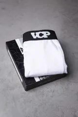 Bóxer blanco con cintura elástica negra con logo VCP en blanco.