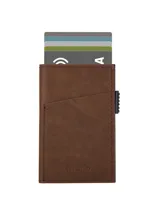 Billetera marrón de cuero sintético con ranuras para tarjetas. Cuenta con un mecanismo de expulsión automática de tarjetas y capacidad para 5 a 7 tarjetas.