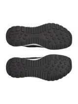 Championes Under Armour Street Mirage, color negro con suela blanca.