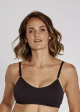 Soutien tipo top de microfibra sin costuras, color blanco, con copas removibles, sin aro y breteles regulables.