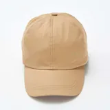 Gorra de béisbol color beige confeccionada en algodón.