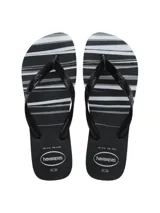 Chancletas Havaianas de hombre con base negra y diseño de rayas horizontales en tonos de gris y blanco.