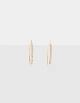 Aros colgantes largos de metal dorado con strass.