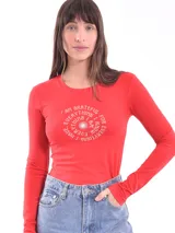 Remera color tostado de manga larga con cuello redondo y estampado de un águila y la palabra 'Merica.