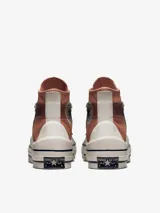 Championes Converse Chuck Taylor All Star Move de caña alta, color terracota con detalles transparentes y suela chunky blanca.