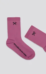 Medias 3/4 color fucsia de algodón con logo de Luxo en la botamanga y estampado de tijeras.