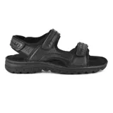 Sandalias marrones de cuero con tiras ajustables con velcro y suela de goma.